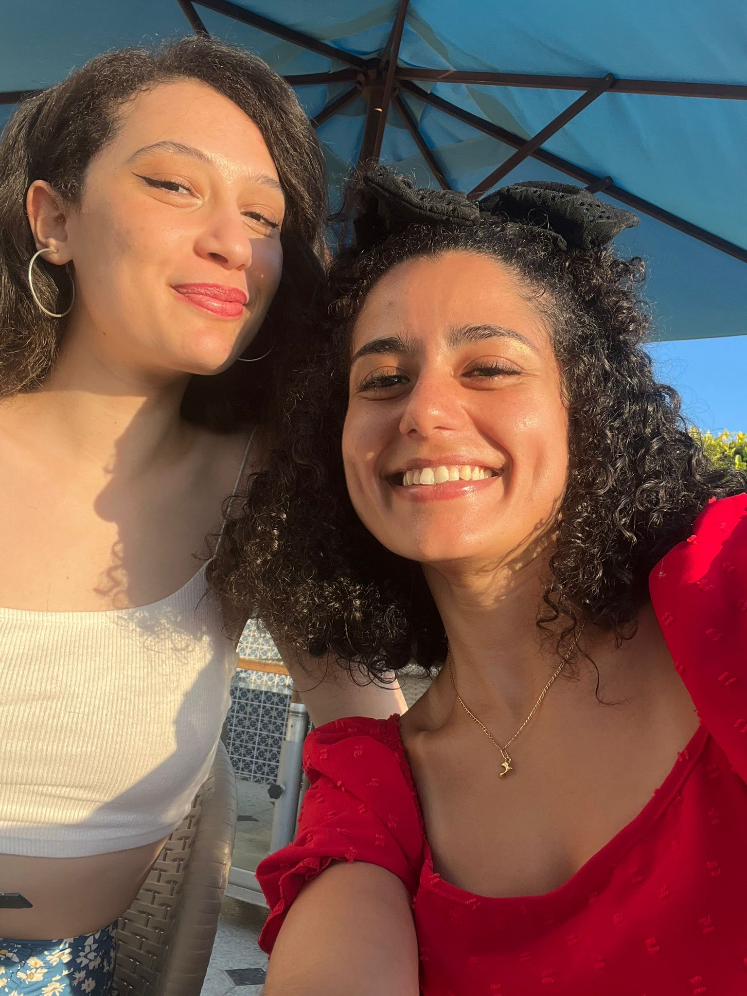 selfie with friend under parasol